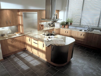 Cragside kitchen in a birch finish with a curved island