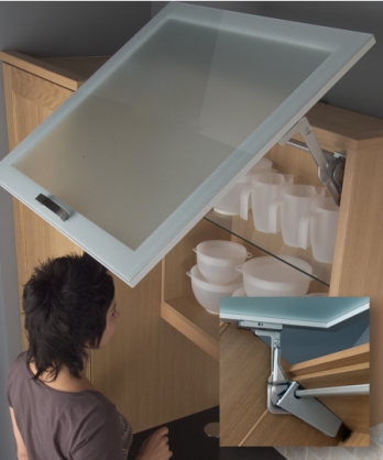 Swing-up lift system holding a glazed wall cabinet door open