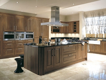 Eterno Walnut kitchen with a dark timber island